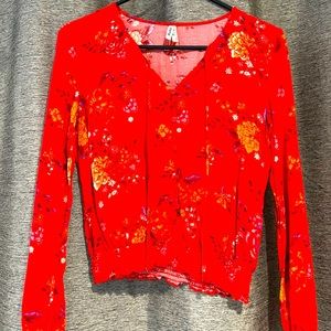 Red floral button up top.